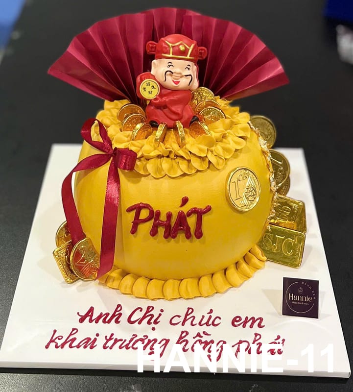 Bánh kem túi tiền vàng Thần Tài đại cát phát lộc khai trương Hannie