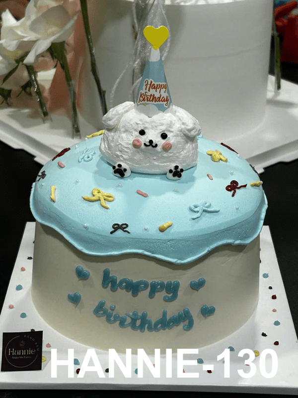 Bánh kem sinh nhật bé trai hình cún bông xanh pastel đáng yêu Hannie